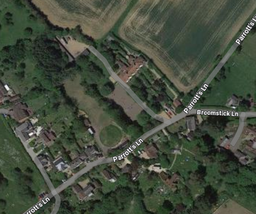 Aerial view of Buckland Common showing the rural location and surrounding countryside